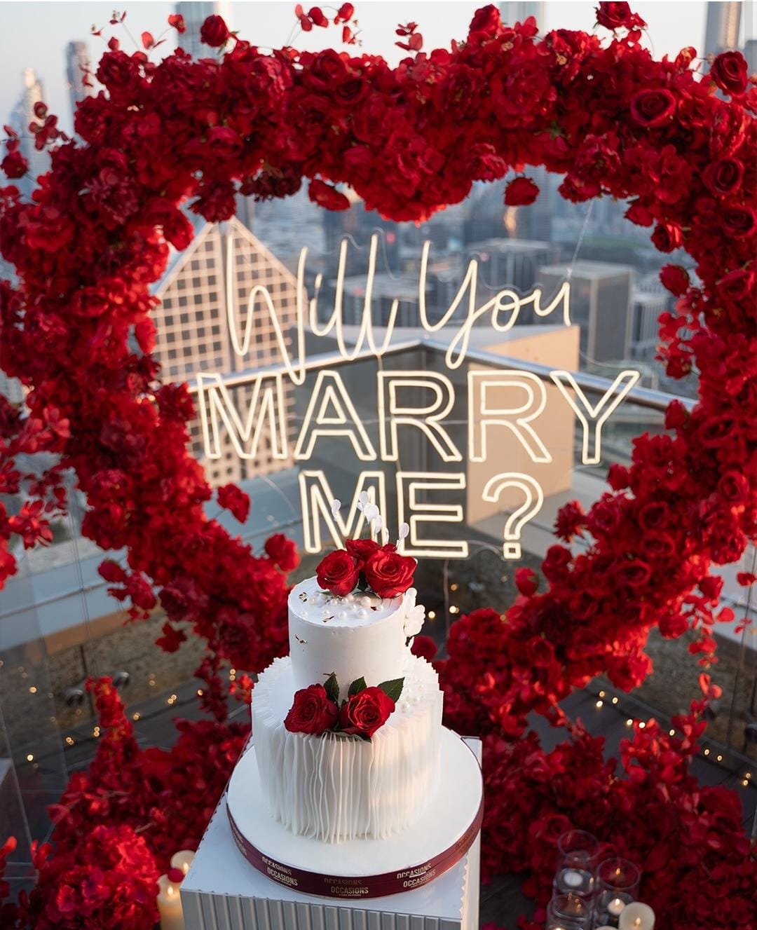 Customised cake and setup by The Tenderful - floral heart backdrop with tiered cake
